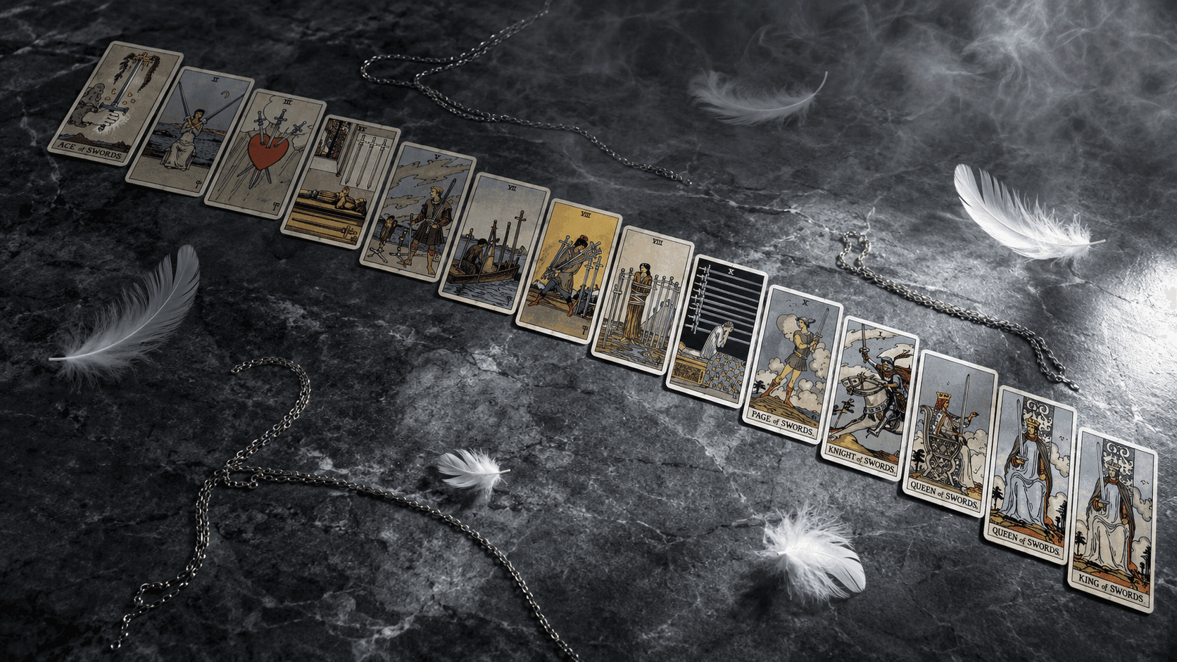 Complete guide to Suit of Swords tarot cards arranged diagonally on grey stone with dramatic lighting and sword imagery